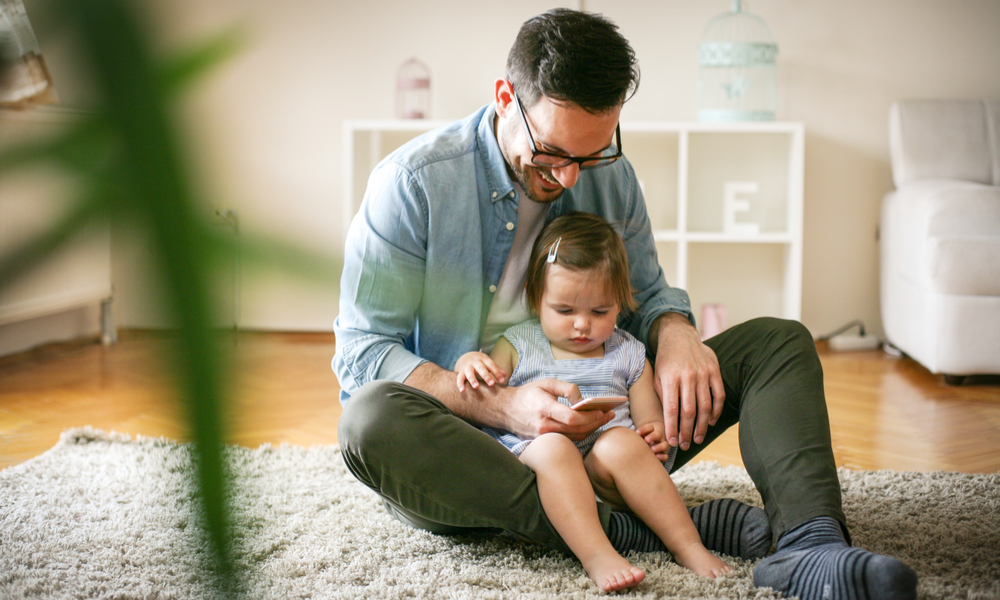 Parent researching parenting on mobile device