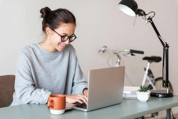 Marketing professional using laptop