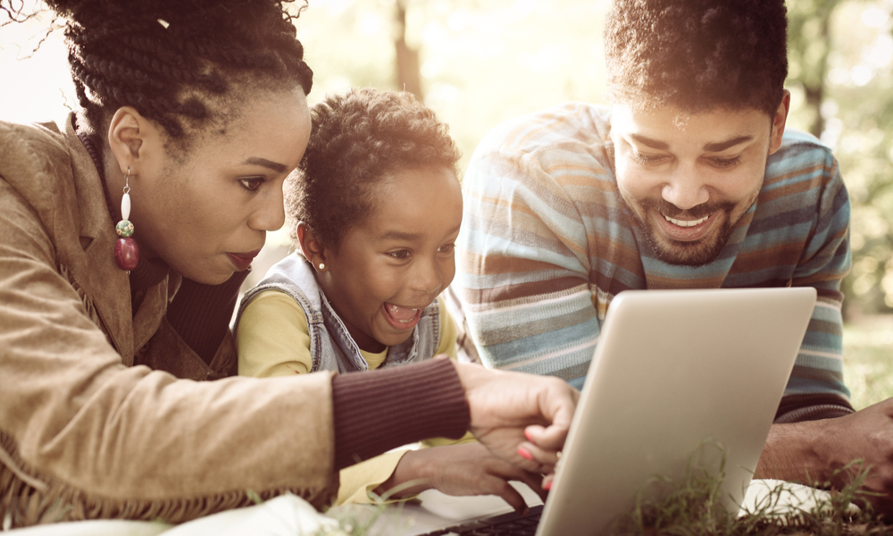 Family using computer to view childcare center website