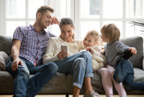 Family interacting on phone