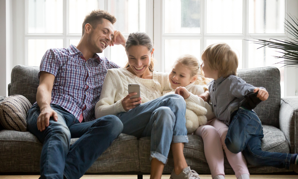 Family interacting on phone