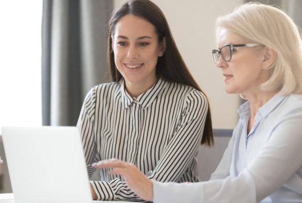 women working on computer