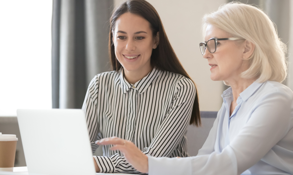 women working on computer