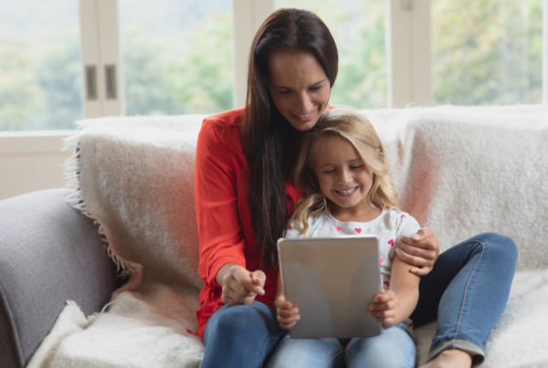 Mom and daughter on tablet